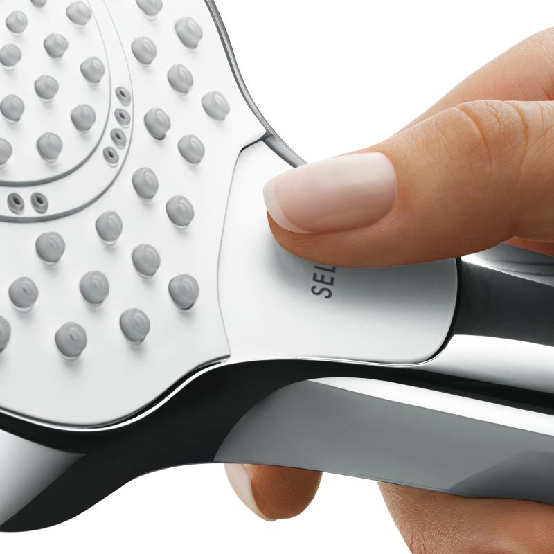 Douchette Grohe grise et blanche, zoom sur le bouton de sélection, design moderne.