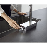 Mitigeur de cuisine chromé Hansgrohe, robinet moderne couleur argent, installation sur évier