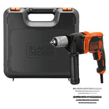 Perceuse filaire Black+Decker orange et noire avec mallette et forets inclus.