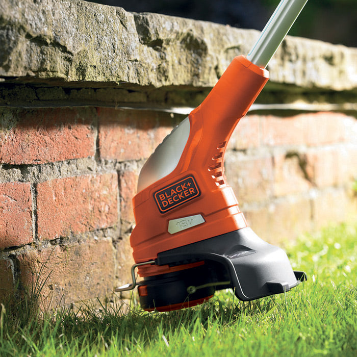 Coupe-bordures BLACK+DECKER orange et noir, outil de jardinage pour herbe