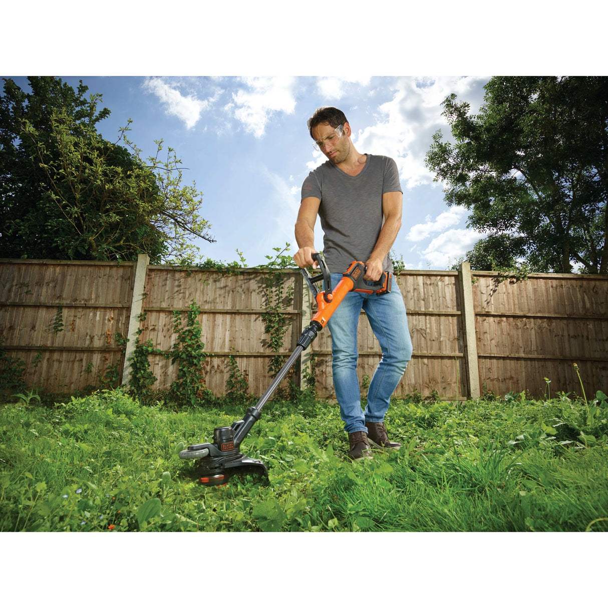 Coupe-bordure Black+Decker, outil de jardinage électrique, couleur orange et noir