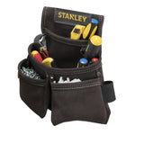 Porte-outils Stanley en cuir marron, rempli d’outils et de vis, marque visible.