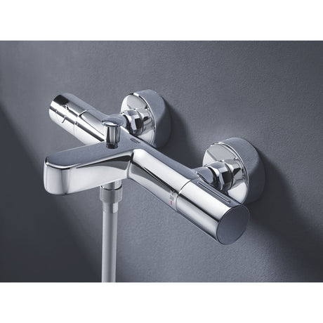 Mitigeur de bain thermostatique Grohe, robinet mural couleur chrome brillant