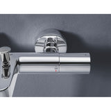 Mitigeur thermostatique de marque Grohe, finition chromée, montage mural