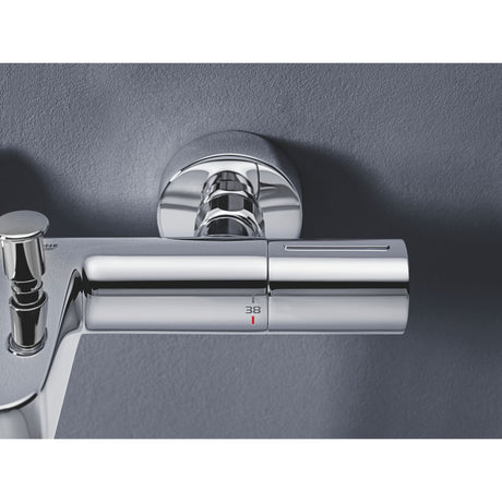 Mitigeur thermostatique de marque Grohe, finition chromée, montage mural