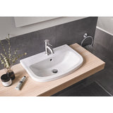 Lavabo blanc Grohe, vasque salle de bain en céramique, couleur blanche, robinet chrome.