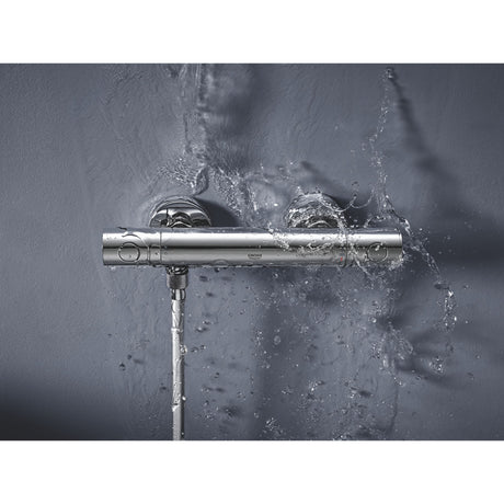 Mitigeur thermostatique de douche Grohe chromé, robinet mural moderne avec eau