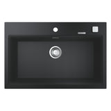 Évier Grohe rectangulaire noir, cuisine, moderne, avec bonde centrale en inox.