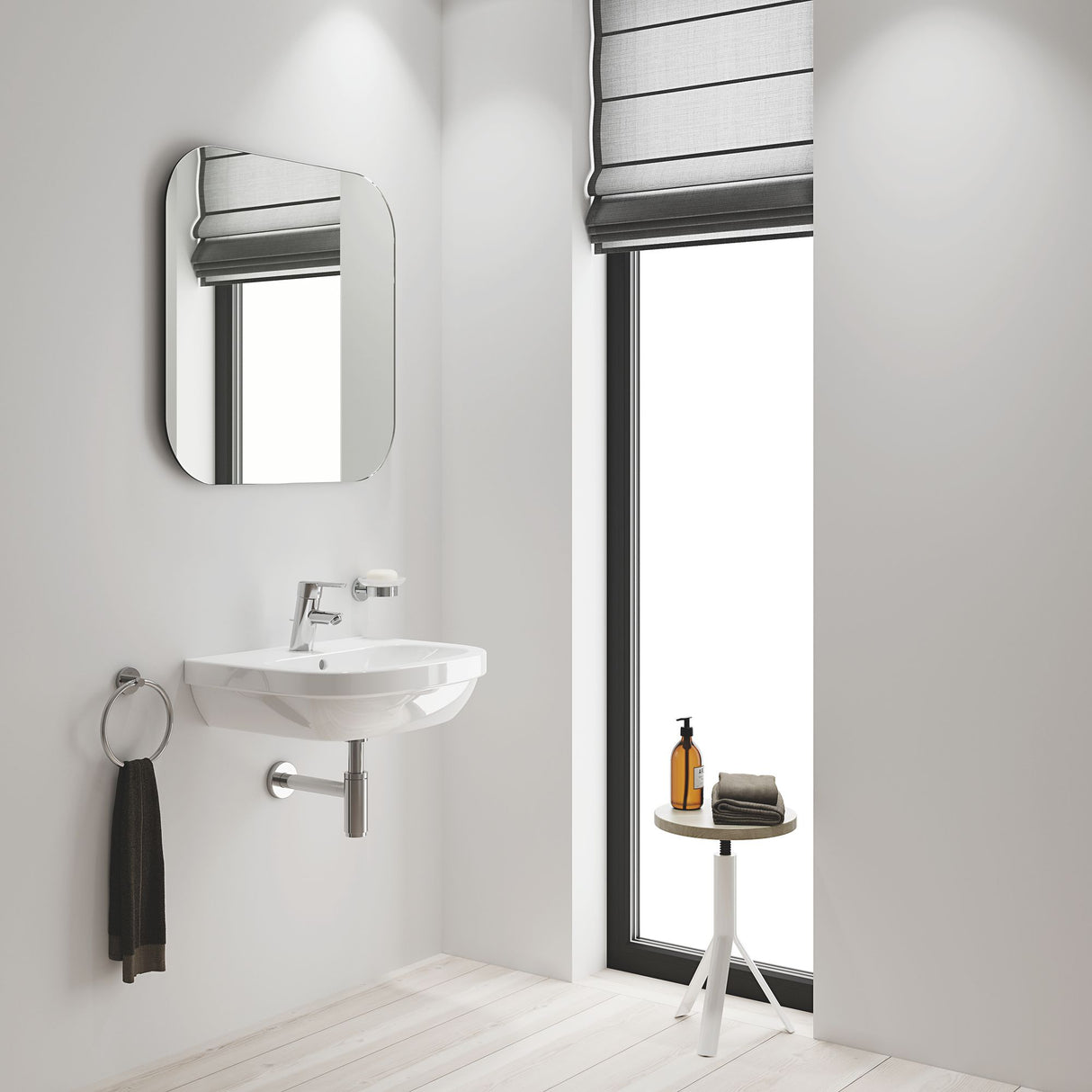 Lavabo blanc Grohe, meuble suspendu dans une salle de bain moderne, robinet chrome.