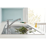 Mitigeur de cuisine Grohe, robinet chromé, couleur argent, design moderne.