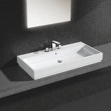 Lavabo blanc Grohe rectangulaire moderne, robinet chromé, posé sur plan gris