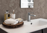 Crédence salle de bain marque Vipanel, type Velvet, couleur marbre Emperador.